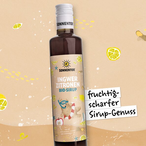 Sonnentor ginger lemon organic syrup bottle with lemon illustration and text “fruity spicy syrup enjoyment”